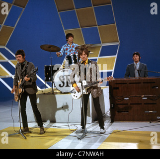 SMALL FACES UK group on Top Of The Pops in 1966. From l: Ronnie Lane, Kenny Jones, Steve Marriott, Ian McLagan Stock Photo