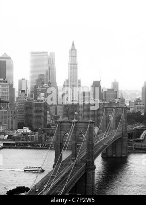 A shot of the brooklyn bridge in New York City - black and white. Stock Photo