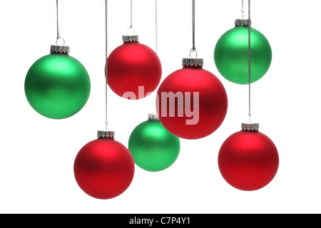 Christmas balls hanging over white background Stock Photo