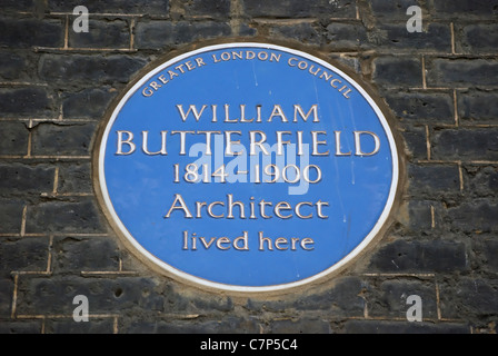 greater london council blue plaque marking a home of architect william butterfield, bedford square, london
