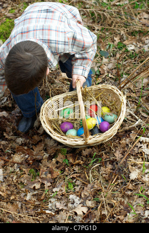 Boy collecting Easter eggs