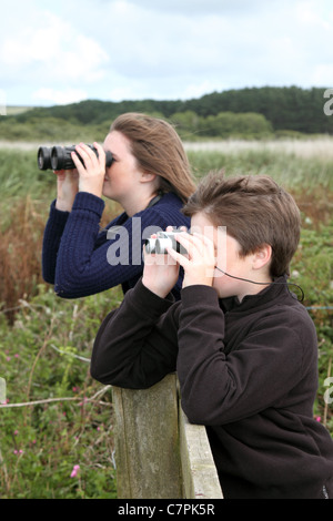 Children Bird Watching; Marazion; Cornwall Stock Photo