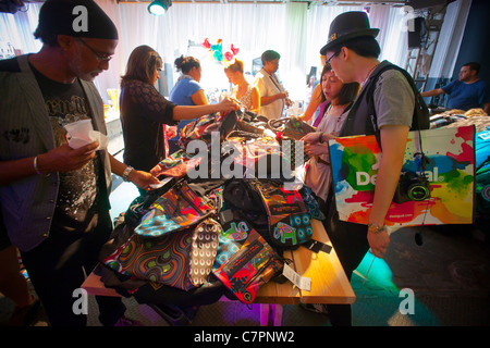 Shoppers browse heavily discounted merchandise at a Desigual pop-up store in the Dumbo neighborhood of Brooklyn in New York Stock Photo