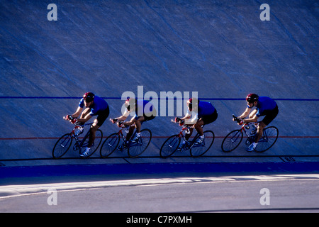 Cycling team competing on the velodrome track. Stock Photo