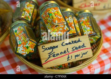 Sugar Coated Fennel seeds in small jars at Chelteham Farmers' Market Stock Photo