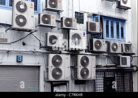 Air conditioning extractors in a Singapore alley. Stock Photo