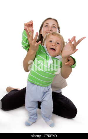 Young happy Mother and its Son isolated on white. Stock Photo