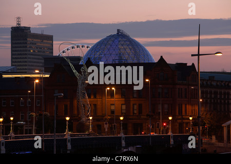 Belfast skyline with Victoria Square dome, Thanksgiving Square, Beacon of Hope Statue and Queen's bridge Stock Photo