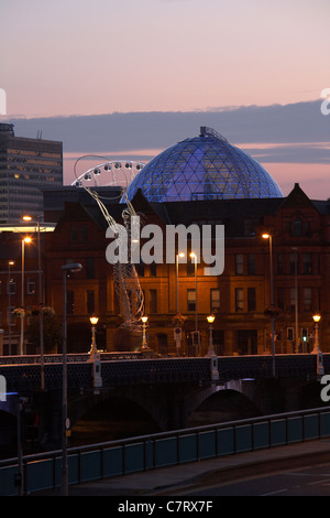 Belfast skyline with Victoria Square dome, Thanksgiving Square, Beacon of Hope Statue and Queen's bridge Stock Photo