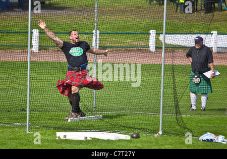Gregor Edmunds, heavyweight athlete and strong man, after throwing the hammer at Cowal Highland Gathering, 2011, Dunoon. Stock Photo