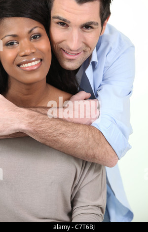 Couple embracing on white background Stock Photo