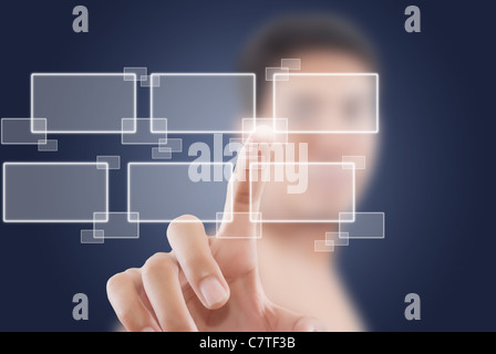 Asian businessman pushing button on the whiteboard. Stock Photo