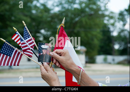 Grandmother of a Marine shows her support at the funeral of fallen Marine Lance Corporal Travis M. Nelson. Stock Photo