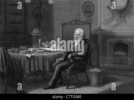 Vintage portrait engraving circa 1880s of American poet and educator Henry Wadsworth Longfellow (1807 - 1882) sitting in his study. Stock Photo