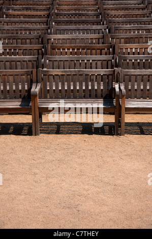 Old grungy wooden benches in the park Stock Photo