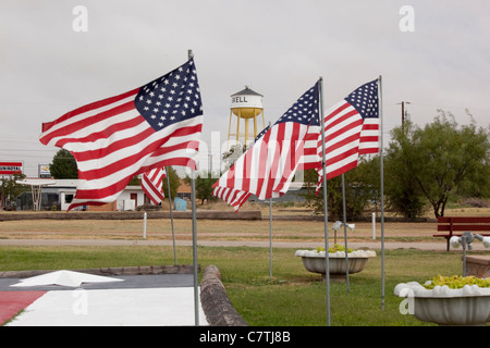 American flags fly daily at the city park in downtown Haskell where Texas First Lady Anita Perry grew up in the 1950's a 1960's Stock Photo