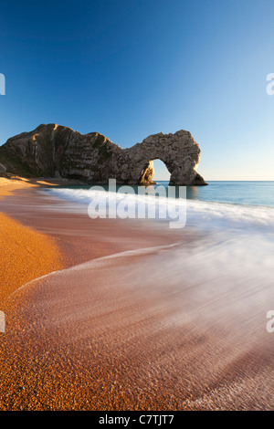 Waves break onto Durdle Door beach, Jurassic Coast, Dorset, England. Winter (January) 2011. Stock Photo