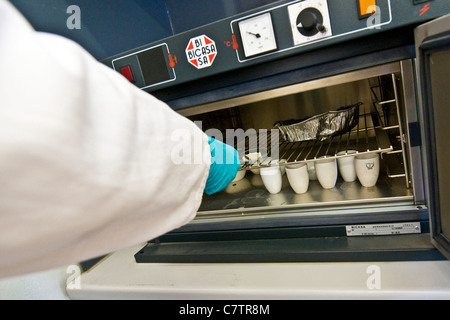 Technician working in testing waters laboratory Stock Photo
