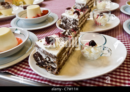 Cakes on a self service restaurant Stock Photo