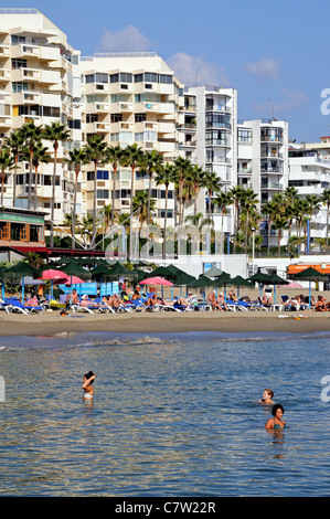 Holidaymakers on the beach, Marbella, Costa del Sol, Malaga Province, Andalucia, Spain, Western Europe. Stock Photo