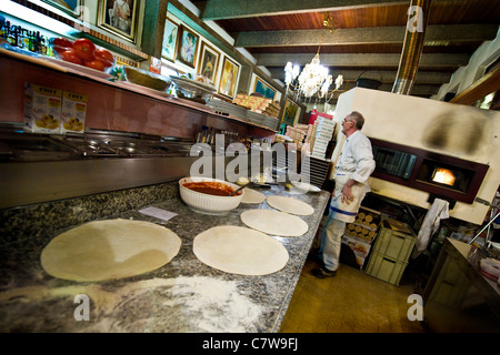 Italy, pizza chef at work Stock Photo