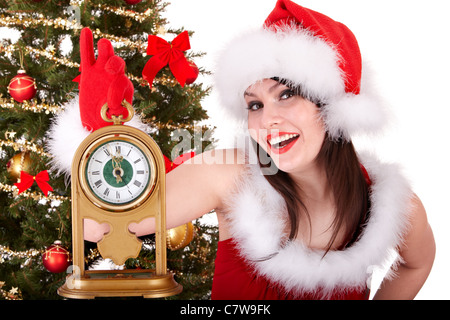 Christmas girl in Santa hat holding stack  gift box. Stock Photo