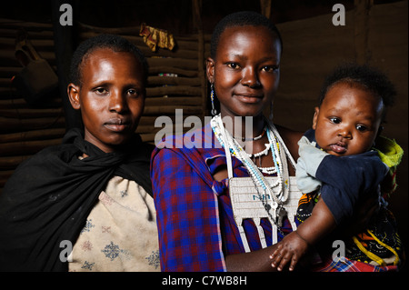 Portrait of a Masai family wearing traditional clothes, Meserani, Tanzania. Stock Photo