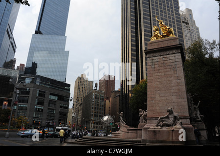 Urban view Maine Monument, across Columbus Circle towards Times Warner Trump International Hotel glass skyscrapers, New York Stock Photo