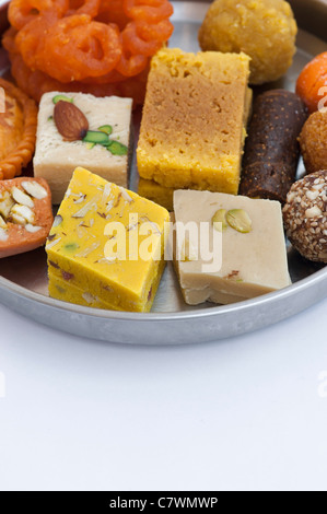 Assorted Indian sweets in a tiffin box Stock Photo - Alamy