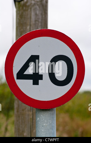 40 mph sign and road traffic safety mirror fixed to a set of steel ...
