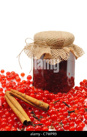 Jar of homemade red currant jam with fresh fruits - isolated Stock Photo