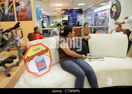 Managua Nicaragua,Metrocentro,shopping shopper shoppers shop shops market women working retail store stores business,center,mall,la Curacao,chain,depa Stock Photo