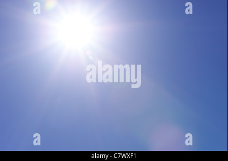 Clear blue sky and sunburst Stock Photo