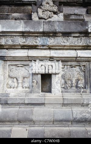 Bas-relief carvings on Shiva Temple, Prambanan, Java, Indonesia  Stock Photo
