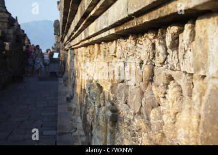 Bas-relief carvings at Borobudur Temple (UNESCO World Heritage Site), Java, Indonesia Stock Photo