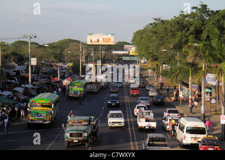 Managua Nicaragua,Pista de la Resistencia,street scene,large avenue,bus,coach,truck,car,traffic,tree lined,billboard,advertisement,ad,busy,Nicar110503 Stock Photo