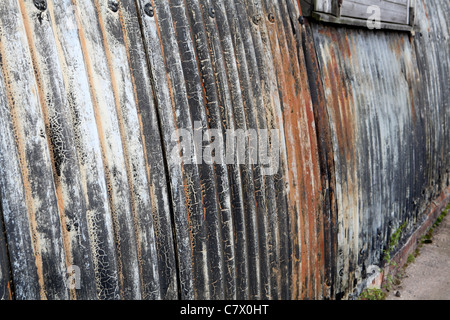 tin sheeting with faded paintwork Stock Photo
