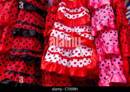 colorful red pink gipsy costumes of flamenco dancer in andalusian Stock Photo