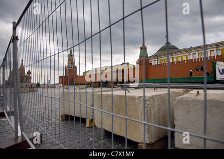 fence,  Saint Basil Cathedral, the Spassky Tower of Moscow Kremlin at Red Square in Moscow. Russia Stock Photo