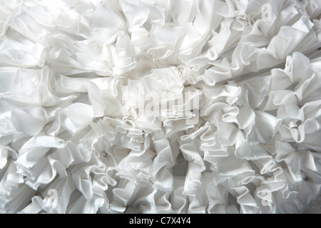 ruffled fabric pleated fashion texture background in white Stock Photo