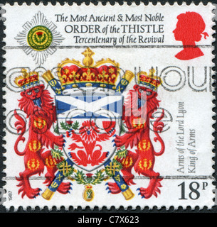 UK - 1987: A stamp printed in England, dedicated to 300th Anniversary of Revival, shows the Order of the Thistle, Scotland Stock Photo