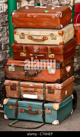 Old fashioned luggage carts with suitcases Stock Photo