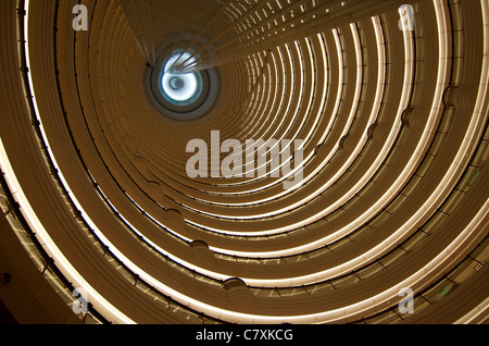 View from the lobby bar of the Grand Hyatt hotel, at the bottom of this impressive atrium, located inside the Jin Mao Tower. Stock Photo