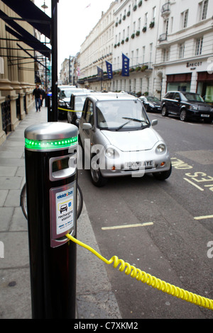 G-Wiz electric car charging up in west end of London at elektrobay recharging station Stock Photo