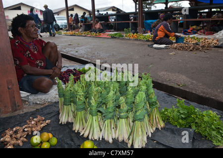 Woman sales Peanuts on Wamena Market, Baliem Valley, West Papua, Indonesia Stock Photo