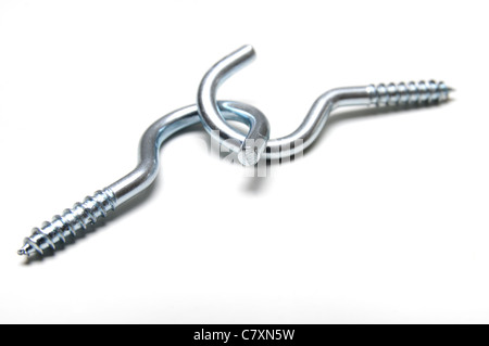 Two connected threaded hooks on white background Stock Photo
