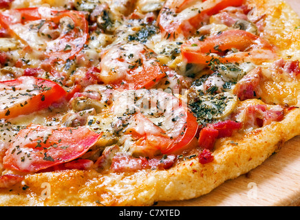 Pizza fast food with tomato and cheese closeup Stock Photo