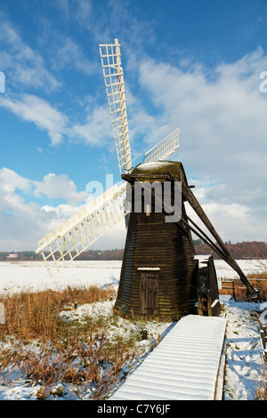 Winter scene of Herringfleet Smock Mill (Windpump), The Norfolk and Suffolk Broads, River Waveney, Suffolk, England, United Kingdom Stock Photo