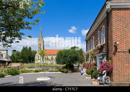 The Compleat Angler Hotel in Marlow with All Saints Church and suspension bridge behind, Buckinghamshire, England, UK Stock Photo