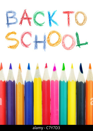 Back to school text and crayons over white background Stock Photo